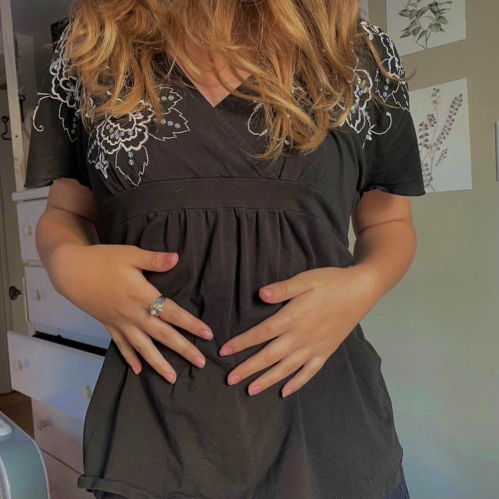 black baby doll short sleeve t shirt (laying swan vibes)